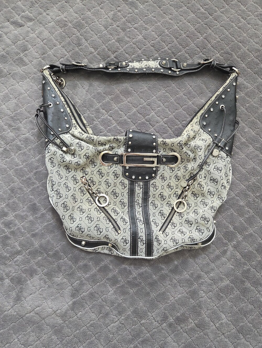 Vintage GUESS canvas shoulder bag with faux-ostrich trim, silver studs, and a de